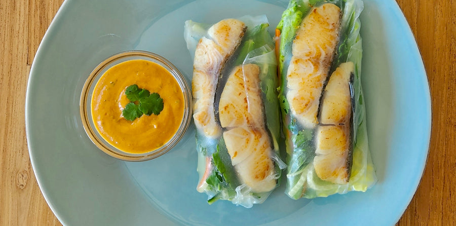 black cod spring rolls on a plate