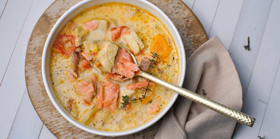 Bowl of seafood chowder with smoked salmon