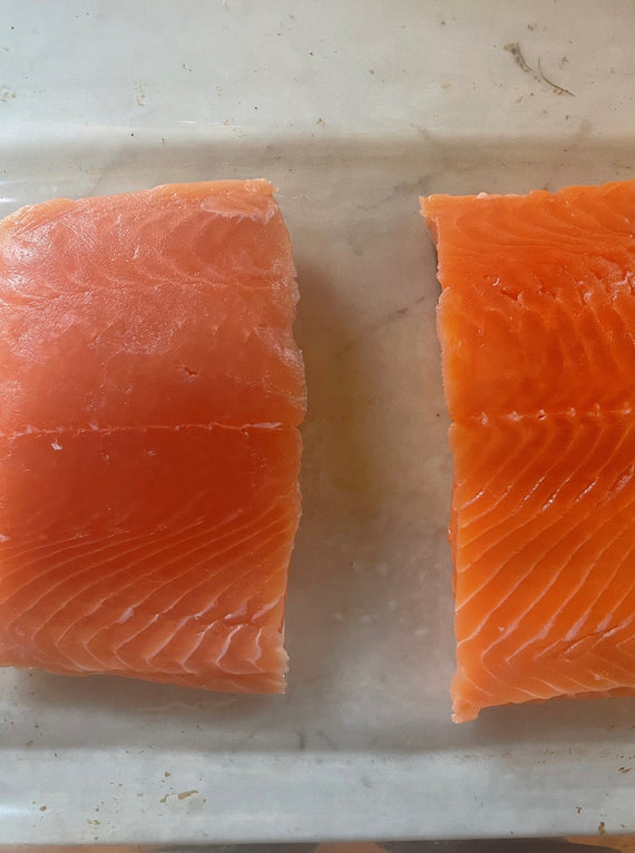 Keta salmon fillet on left and coho salmon fillet on right