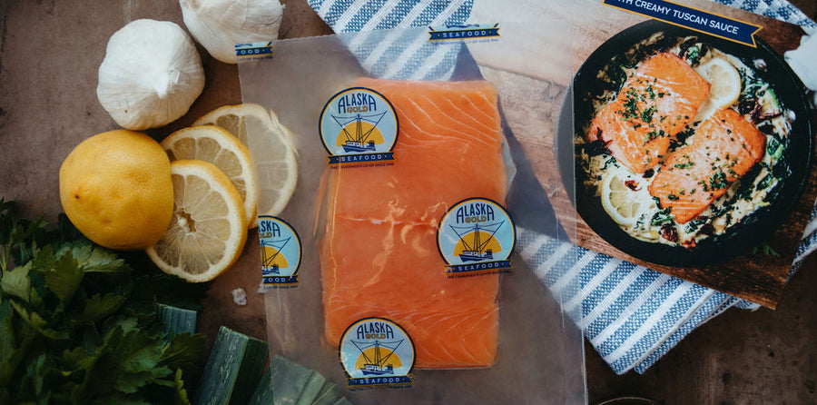 Wild coho salmon fillet in vacuum-sealed bag with recipe card and seasonings