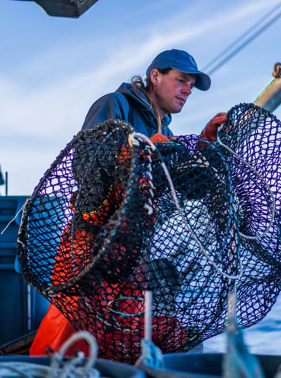 Small boat fisherman using a slinky pot
