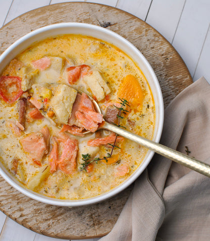 Bowl of seafood chowder with smoked salmon