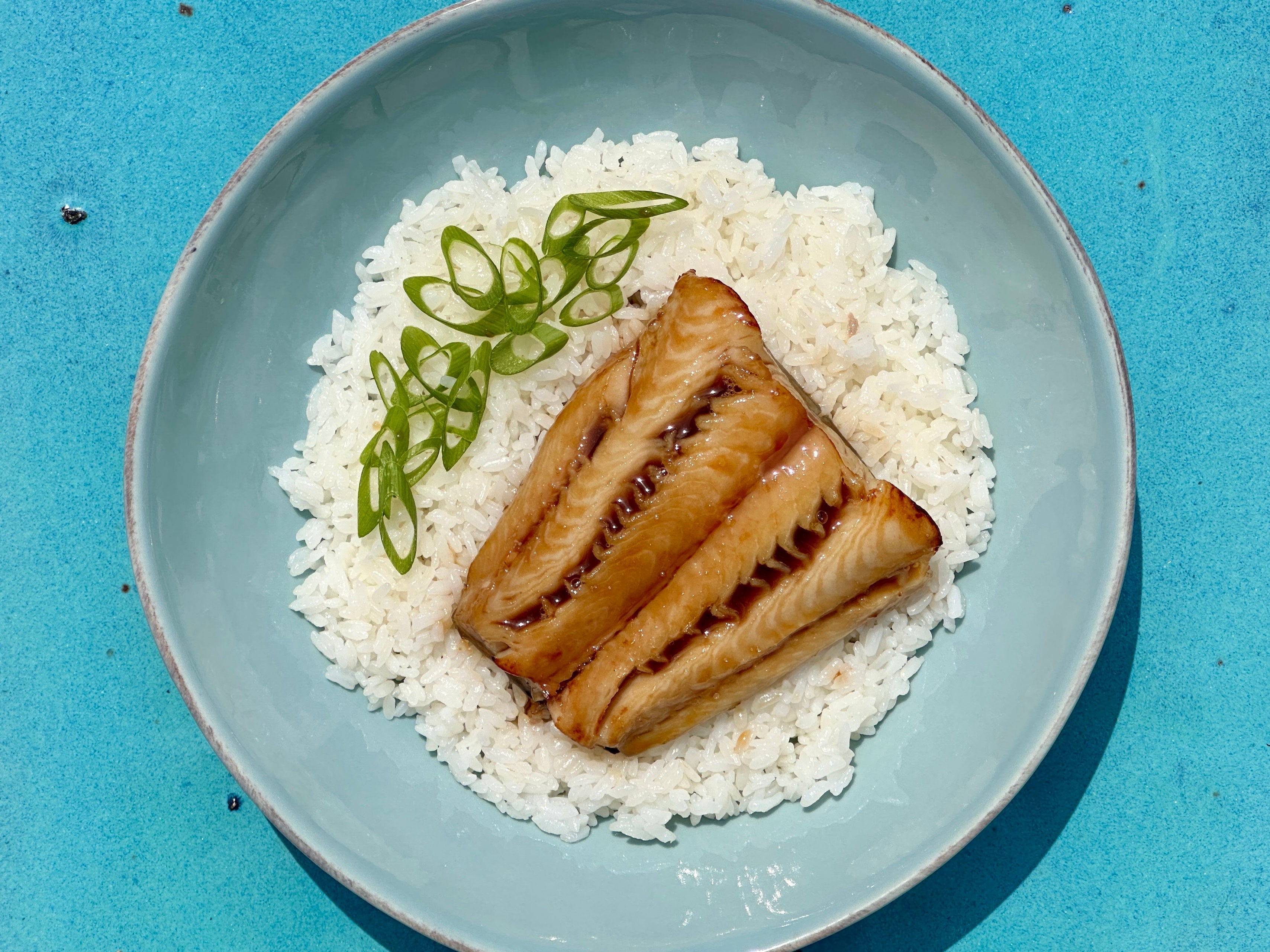 black cod fillets on rice with veggies