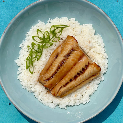 black cod fillets on rice with veggies