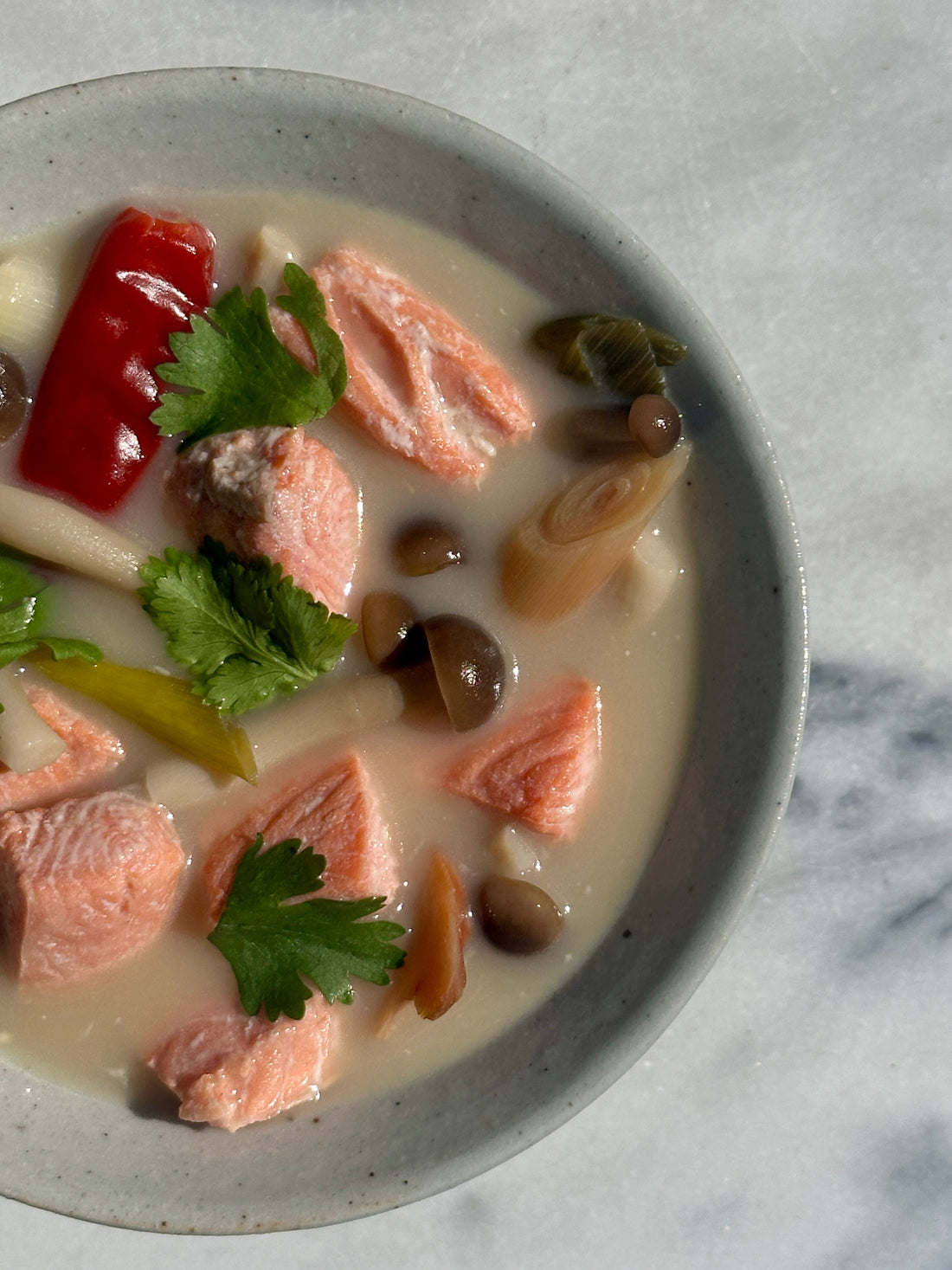 coho salmon in a Tom Kha Gai Soup